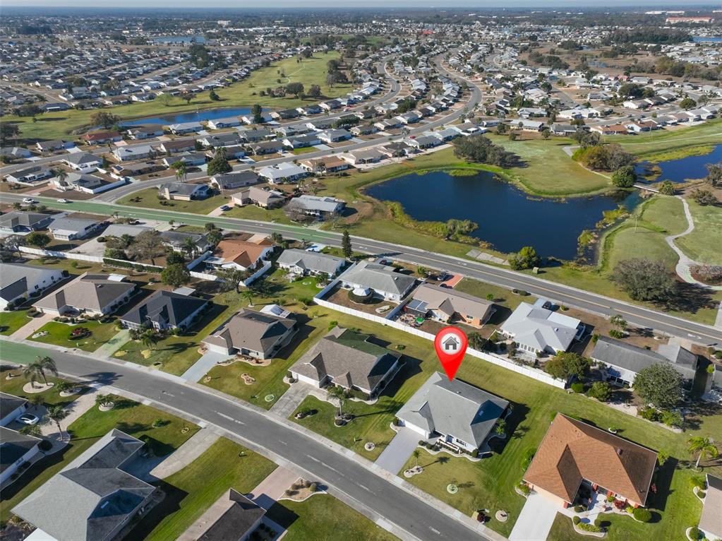 1806 Wedge Court Sun City Center, FL 33573 - Photo 43 of 53 an aerial view of residential houses with outdoor space