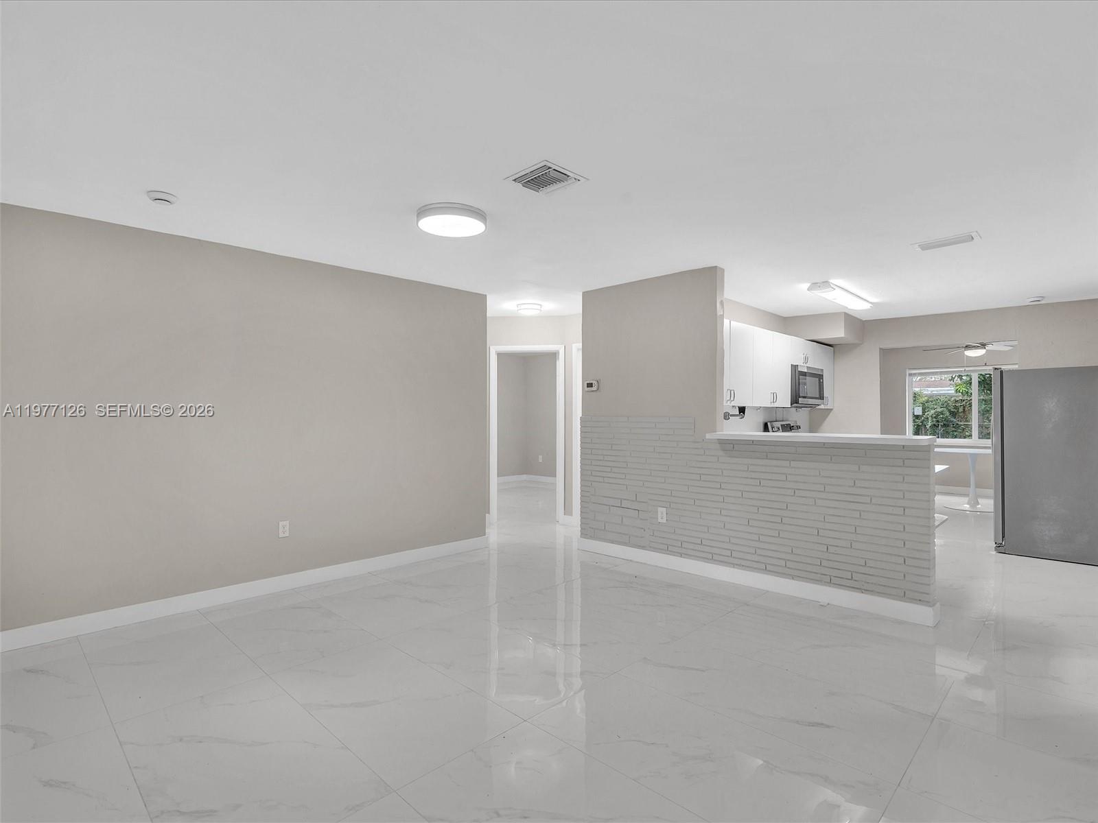 6800 Raleigh Street Hollywood, FL 33024 - Photo 13 of 42 a view of an empty room