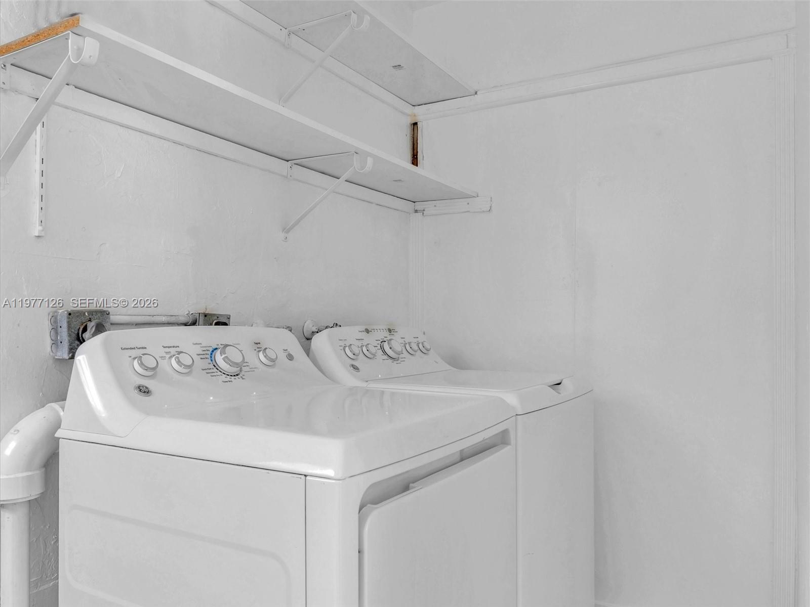 6800 Raleigh Street Hollywood, FL 33024 - Photo 39 of 42 a utility room with dryer and washer