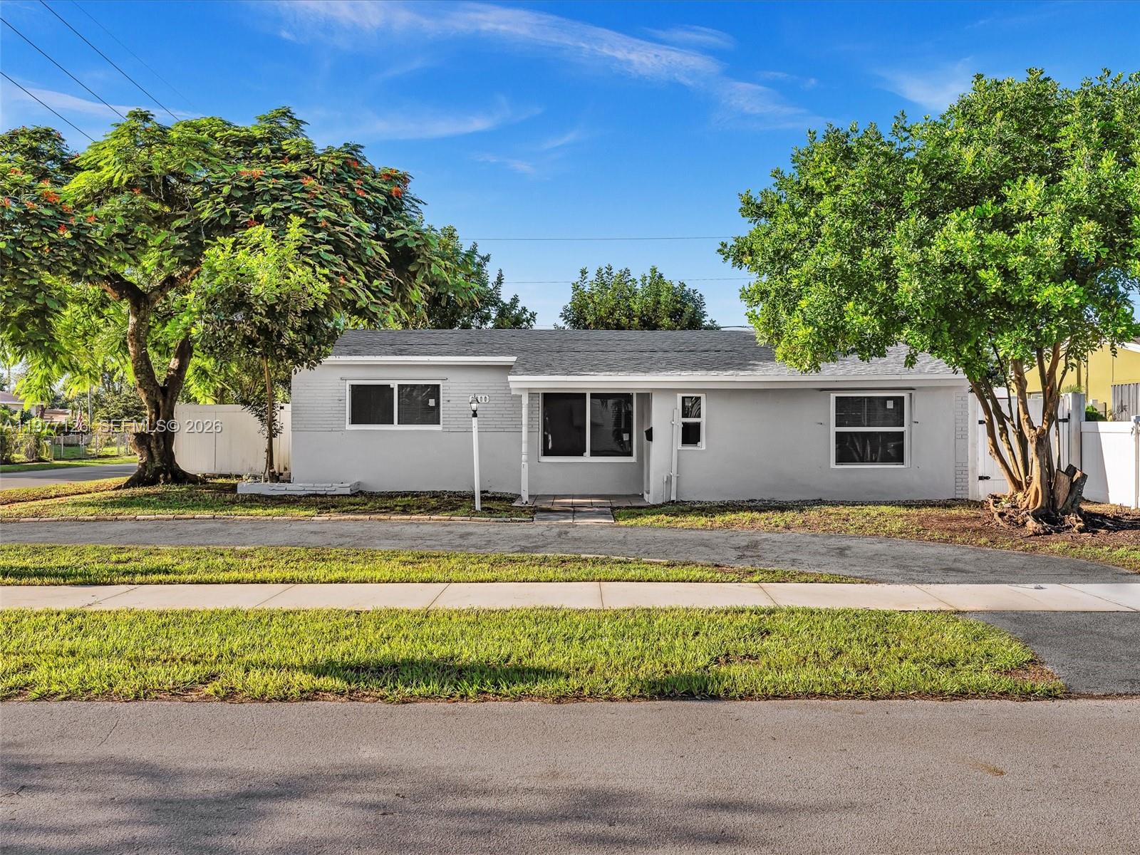 6800 Raleigh Street Hollywood, FL 33024 - Photo 42 of 42 a view of a house with a swimming pool