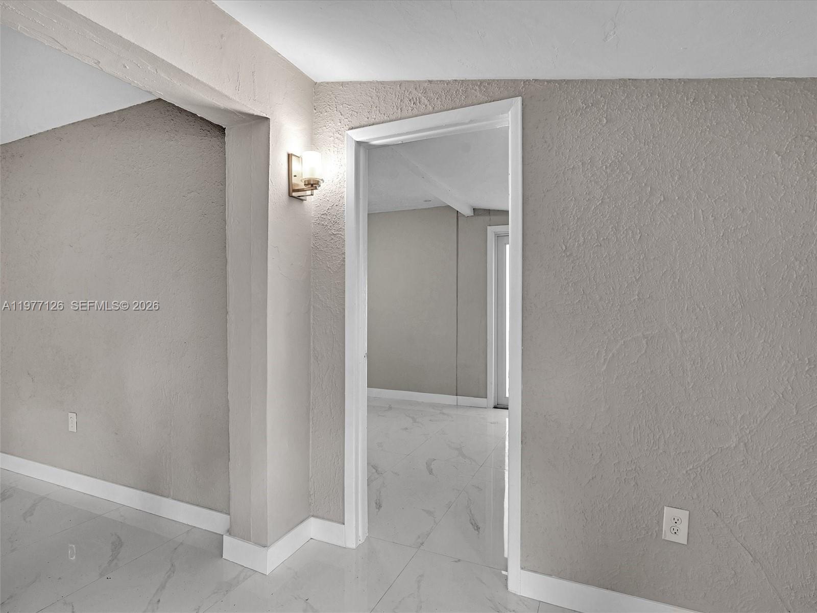 6800 Raleigh Street Hollywood, FL 33024 - Photo 7 of 42 a view of an empty room