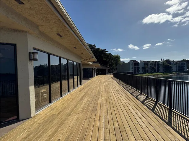 a view of a lake in middle of sunset