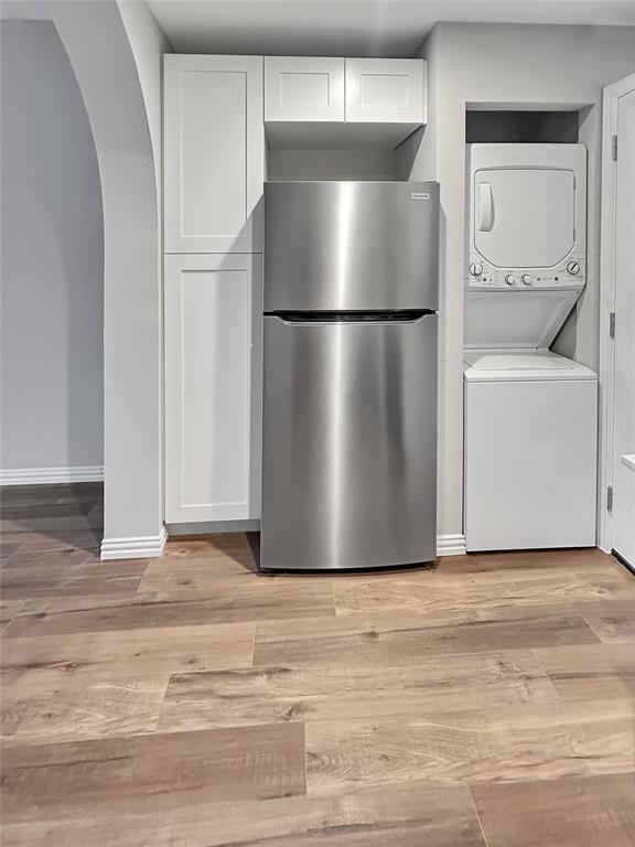 1321 Emily Road, Unit 4101 Dallas, TX 75203 - Photo 5 of 11 a view of a room with wooden floor and closet