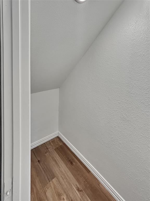 1321 Emily Road, Unit 4101 Dallas, TX 75203 - Photo 6 of 11 a view of a small space with wooden floor