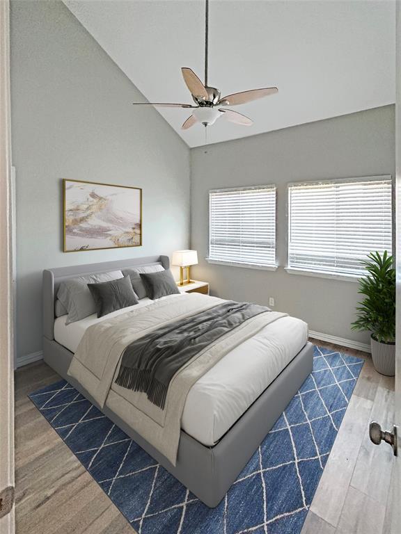 1321 Emily Road, Unit 4101 Dallas, TX 75203 - Photo 9 of 11 a bedroom with a large bed and a window