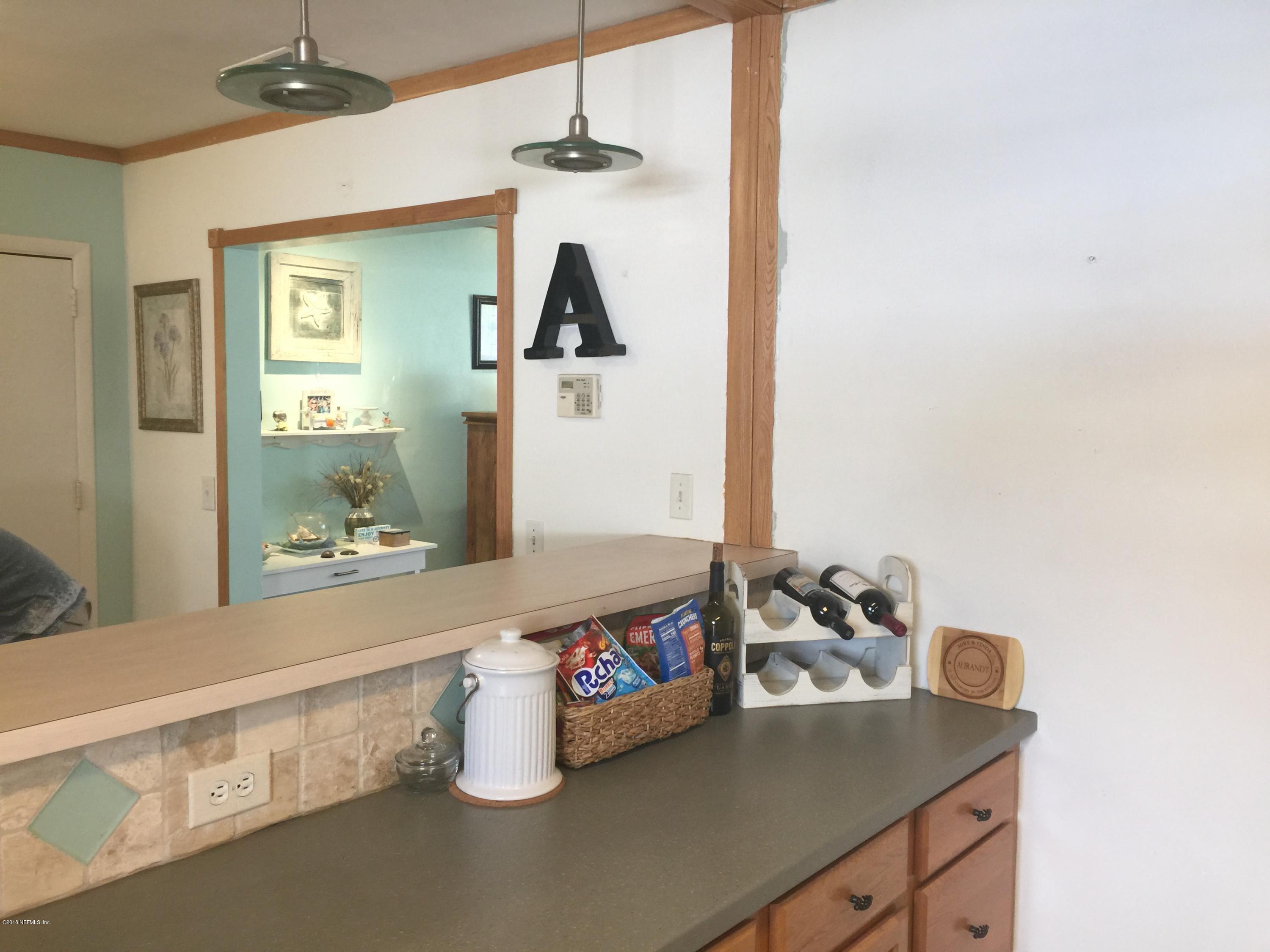 6910 Corkwood Road Jacksonville, FL 32277 - Photo 8 of 29 From Kitchen towards DR & LR
