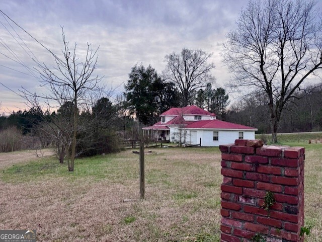 4600 Mahan Road Summerville, GA 30747 - Photo 8 of 18 a view of a house with backyard and trees