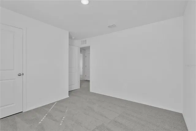 an empty room with window