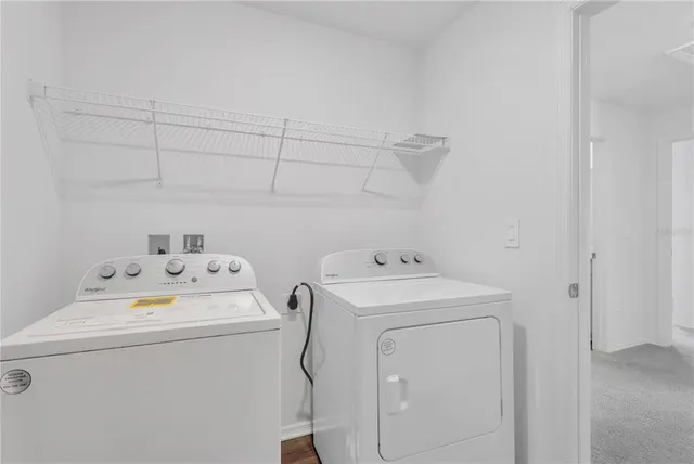 a house view with swimming pool in front of it