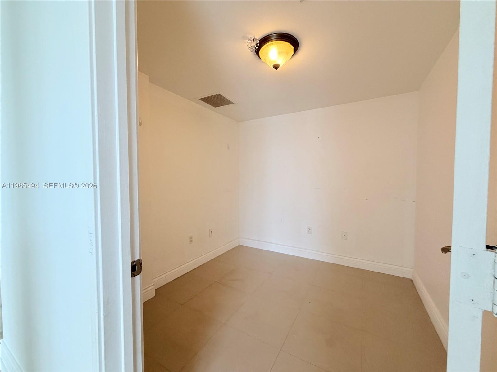 185 Southwest 7th Street, Unit 3304 Miami, FL 33130 - Photo 8 of 17 a view of a small space