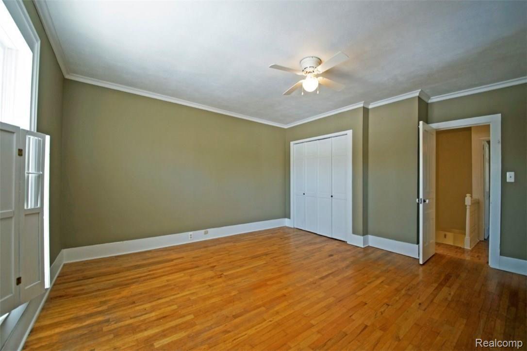 722 North State Street Howell, MI 48843 - Photo 18 of 27 Hardwood flooring in the master bedroom