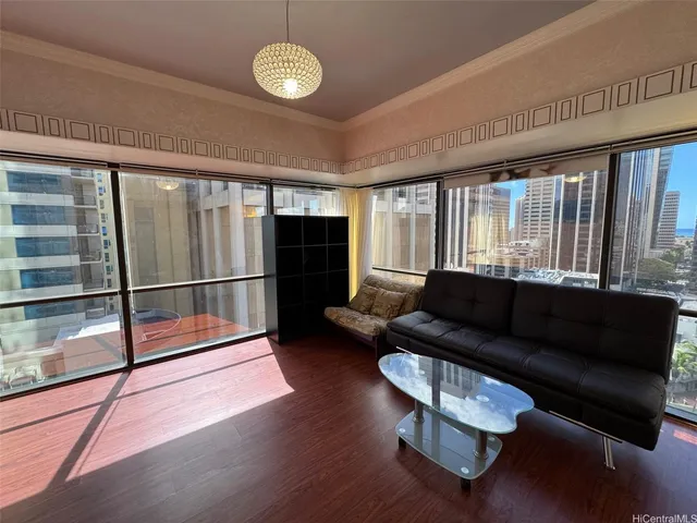 a living room with furniture bathtub and a large window