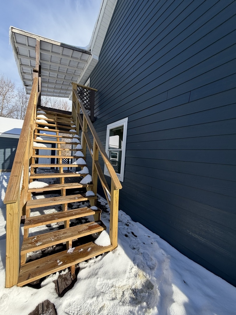 915 South Spencer Road, Unit 2 New Lenox, IL 60451 - Photo 9 of 10 a view of entryway with wooden floor and stairs