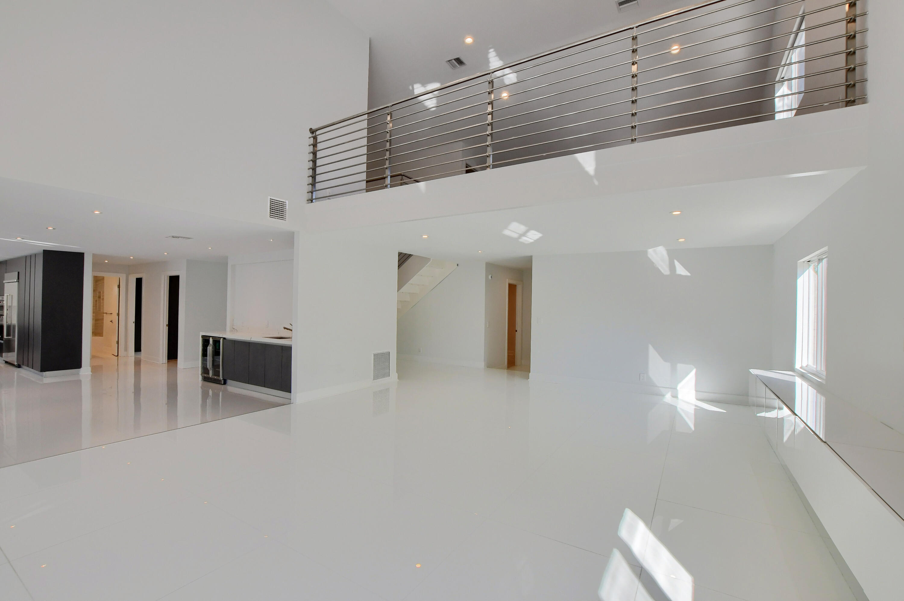 23352 Lago Mar Circle Boca Raton, FL 33433 - Photo 24 of 78 a view of a hallway with wooden floor