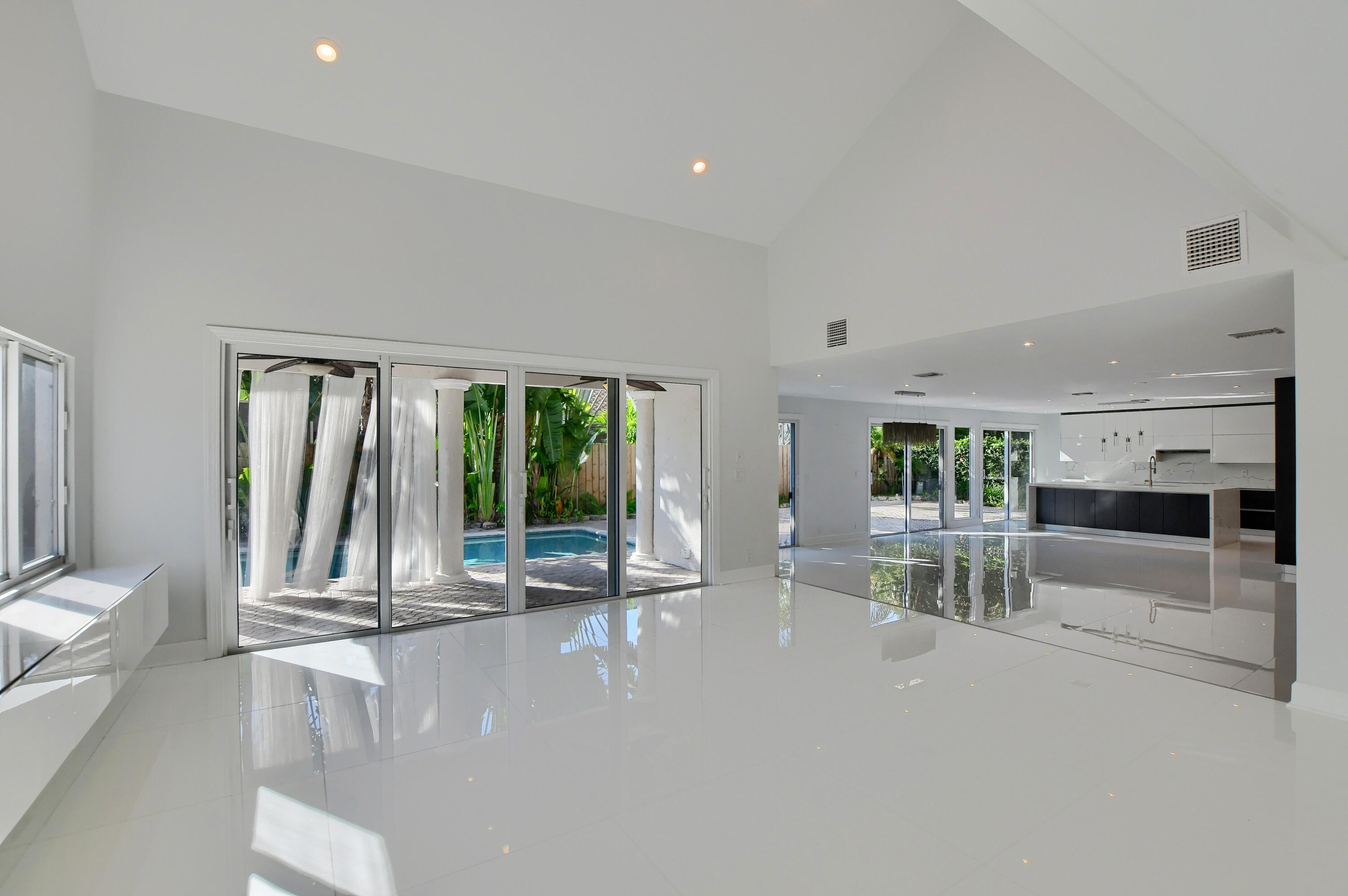 23352 Lago Mar Circle Boca Raton, FL 33433 - Photo 31 of 78 a living room with furniture and large windows