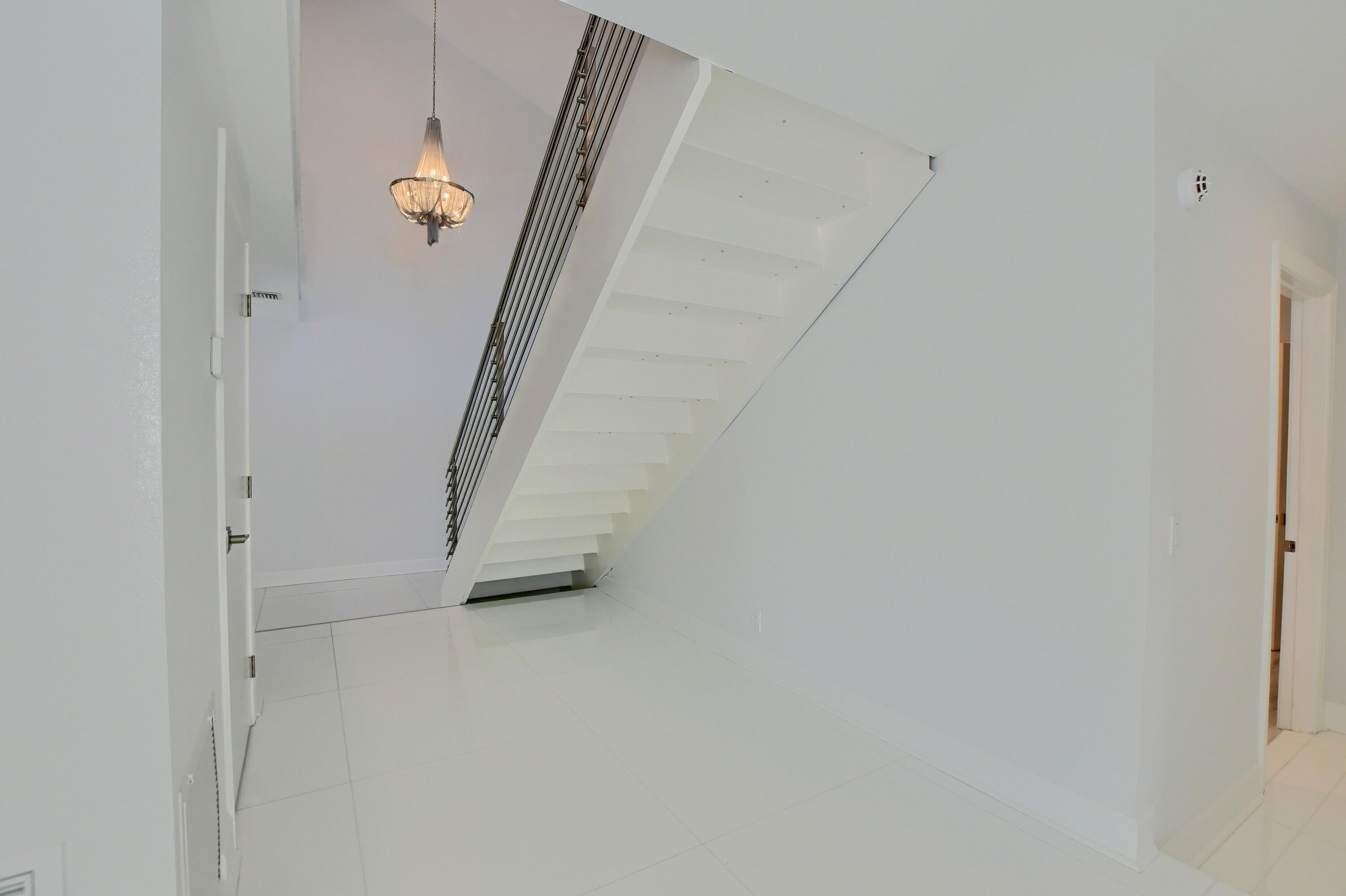 23352 Lago Mar Circle Boca Raton, FL 33433 - Photo 43 of 78 a view of an entryway with stairs