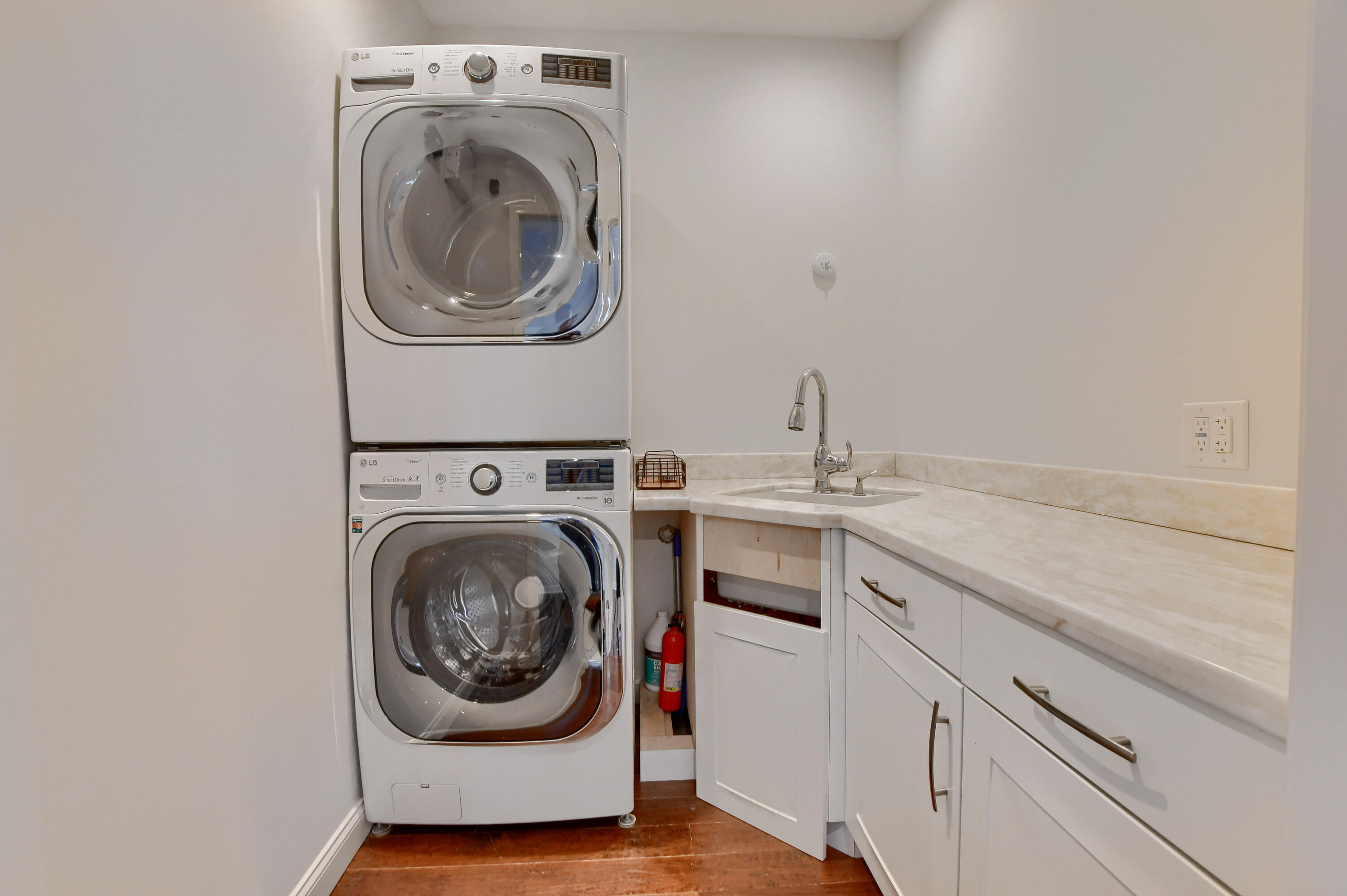 23352 Lago Mar Circle Boca Raton, FL 33433 - Photo 66 of 78 a utility room with sink dryer and washer
