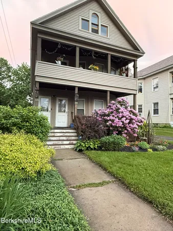 a front view of house with yard