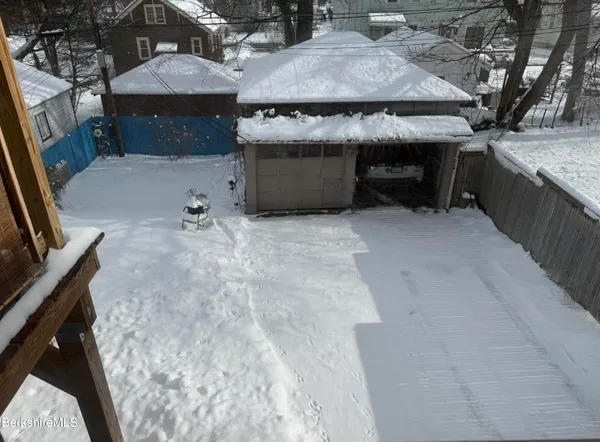 a room with a stove and a table