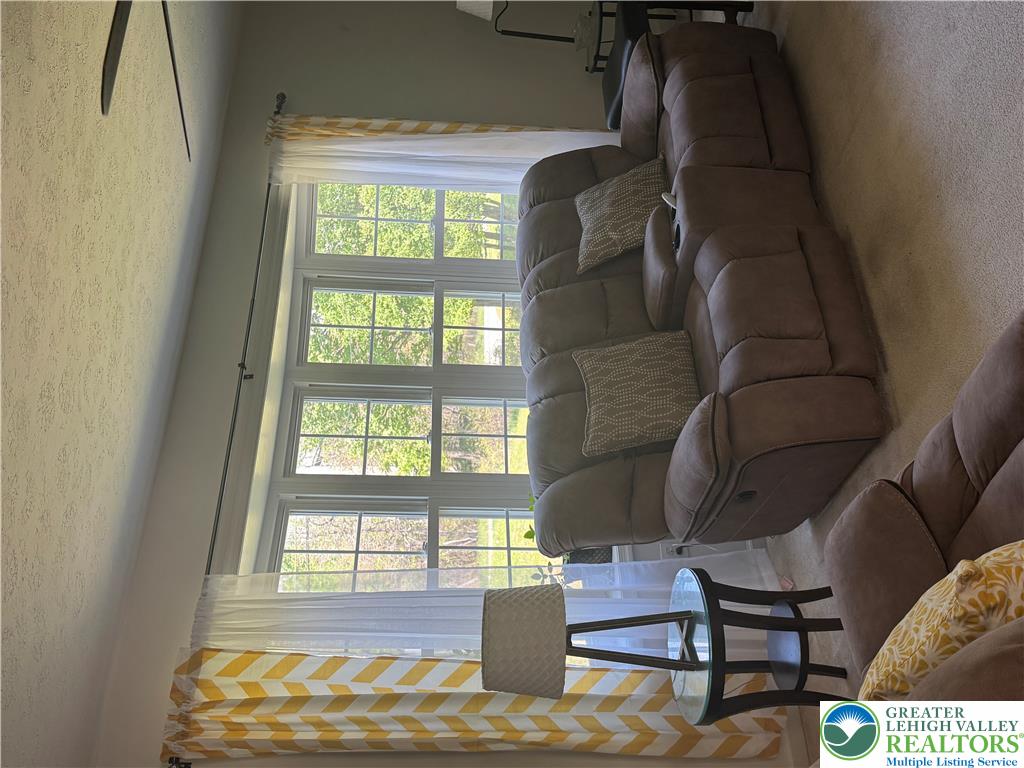 2742 Long Pond Road Long Pond, PA 18334 - Photo 20 of 57 Sun-filled living space offers comfort and expansive views of the outdoors.