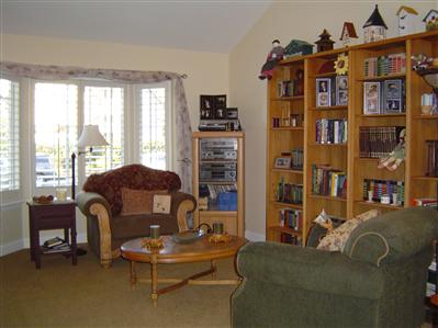 54 Hop Ranch Circle Santa Rosa, CA 95403 - Photo 3 of 8 a living room with furniture a lamp and large window
