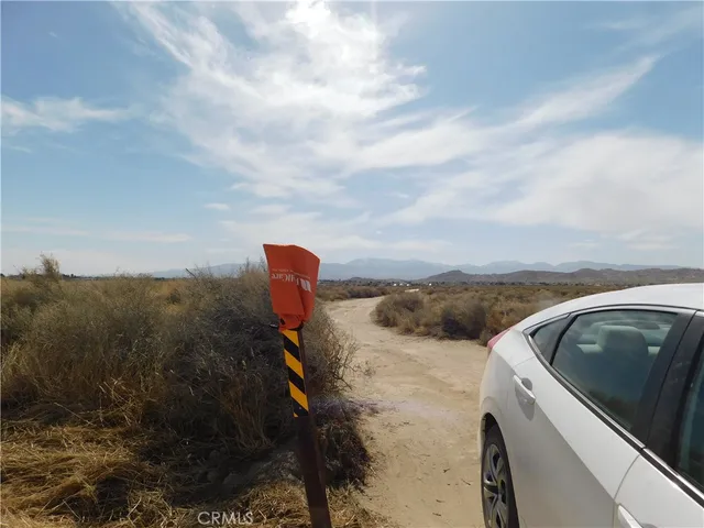 a view of a terrace with a yard