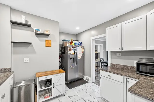 a bathroom with a sink a toilet and a bathtub
