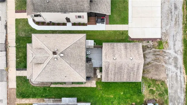 an aerial view of a house with garden
