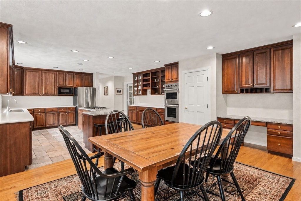 37 Old Planters Road Beverly, MA 01915 - Photo 14 of 42 a view of a dining room with furniture
