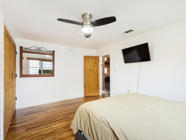 a spacious bathroom with a sink double vanity and a mirror