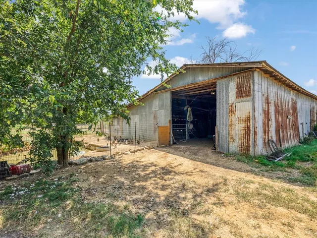 a view of a golf course with a lake