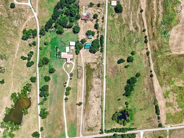 a view of a house with a big yard