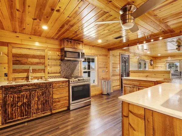 a living room with furniture and a table