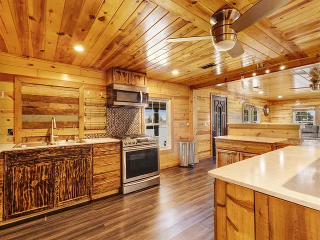a living room with furniture and a table