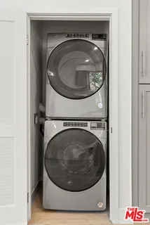 a bathroom with a sink vanity and a mirror