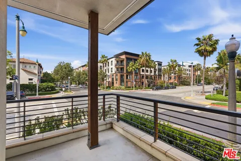 a front view of a multi story residential apartment building