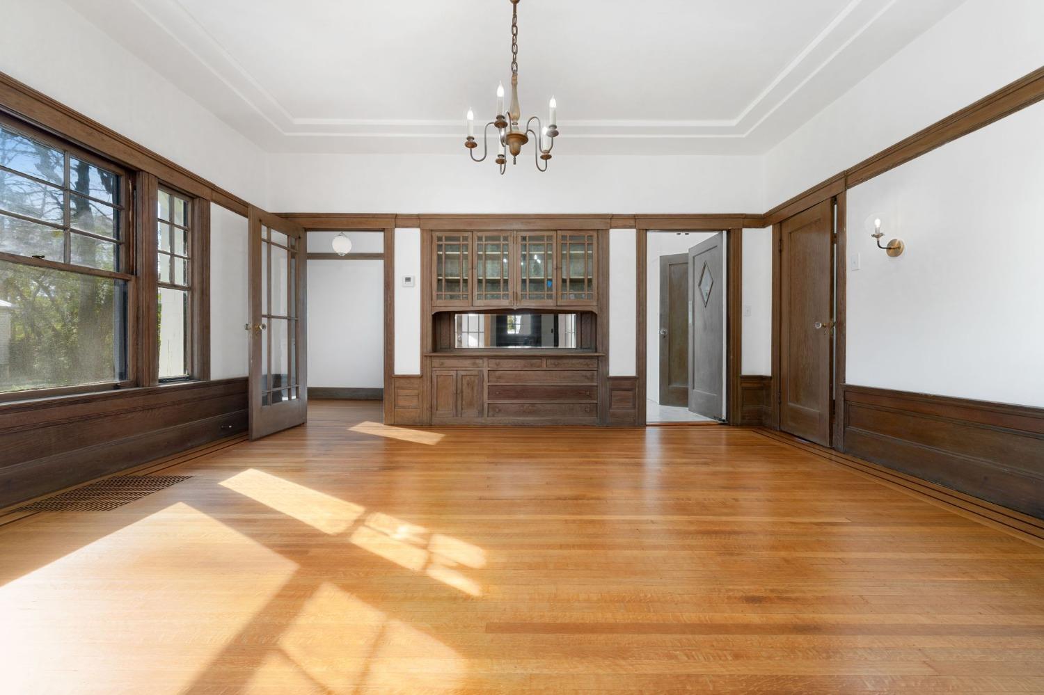 104 King Road Roseville, CA 95678 - Photo 14 of 36 a view of an empty room with a fireplace and a large window