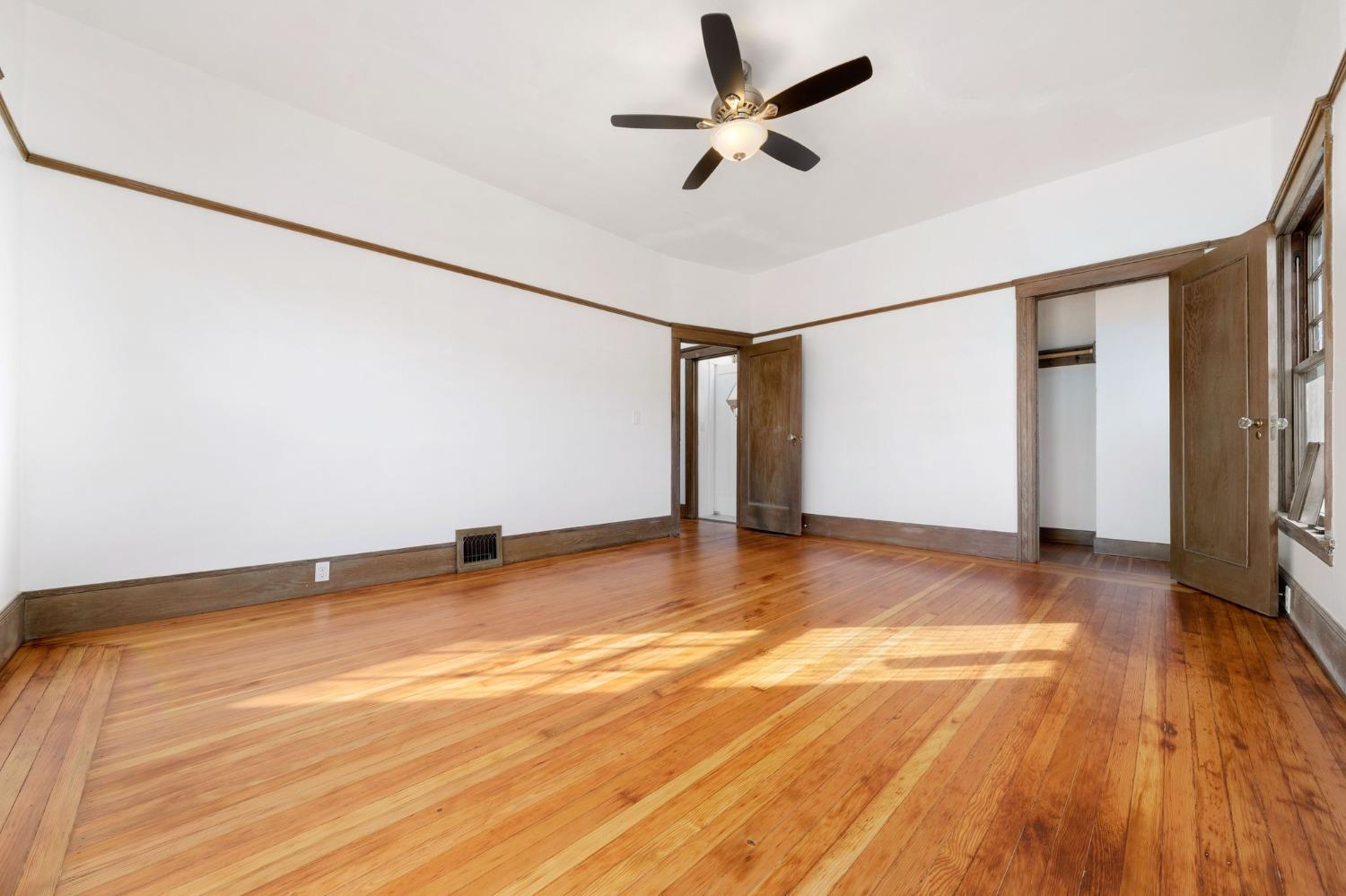 104 King Road Roseville, CA 95678 - Photo 23 of 36 a view of an empty room with wooden floor