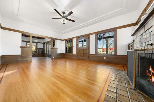 a view of livingroom with hardwood floor and a ceiling fan
