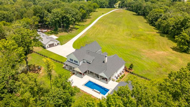 a outdoor living space with furniture and garden view