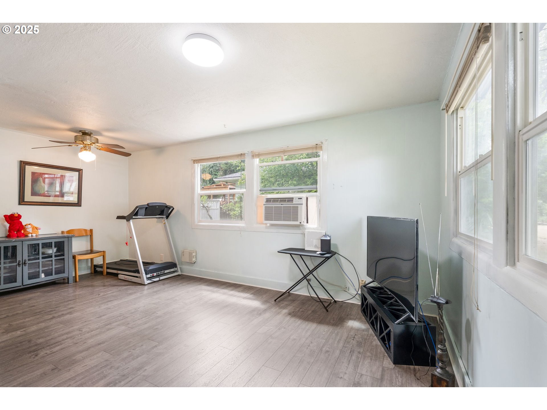 11870 Southwest 13th Street Beaverton, OR 97005 - Photo 10 of 32 a view of a workspace with furniture and a window