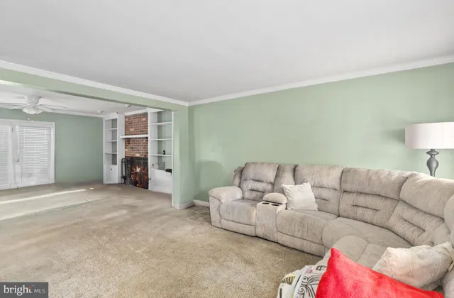 a bed room with a bed and a chandelier