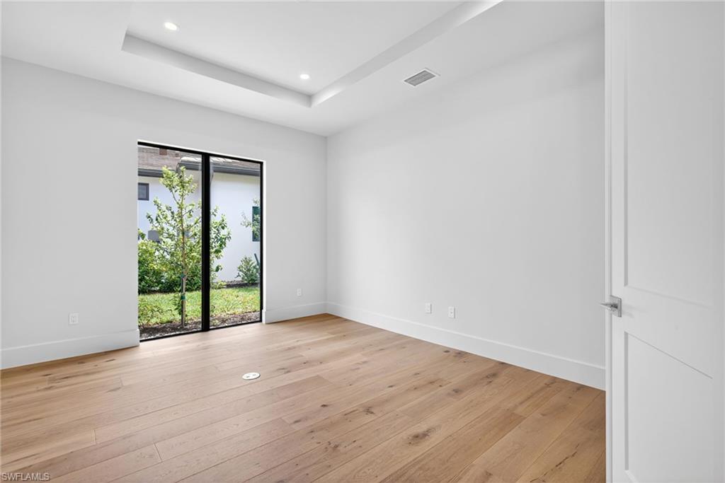 16736 Lucarno Way Naples, FL 34110 - Photo 19 of 49 Study/fex space features large floor to ceiling window