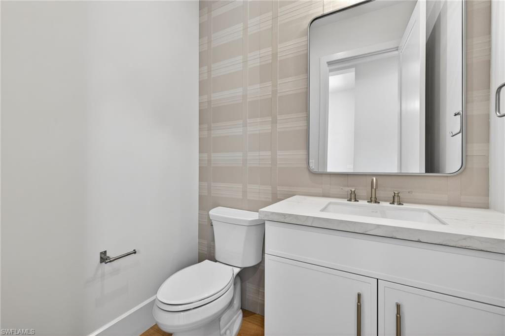 16736 Lucarno Way Naples, FL 34110 - Photo 20 of 49 Powder bathroom