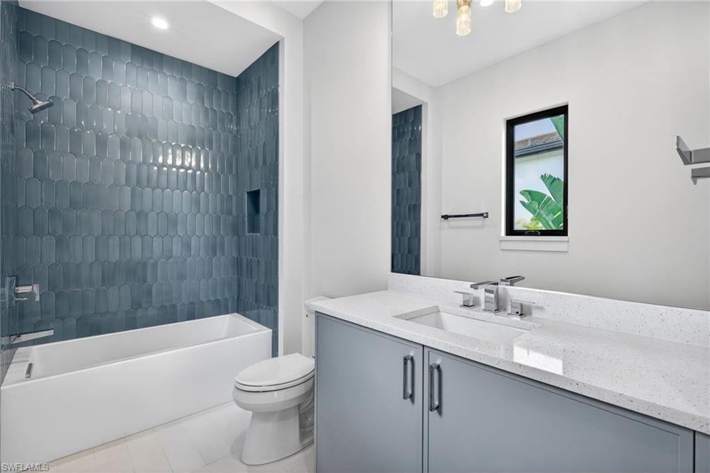 16736 Lucarno Way Naples, FL 34110 - Photo 26 of 49 Bathroom 3 has beautiful tile shower and tub combination