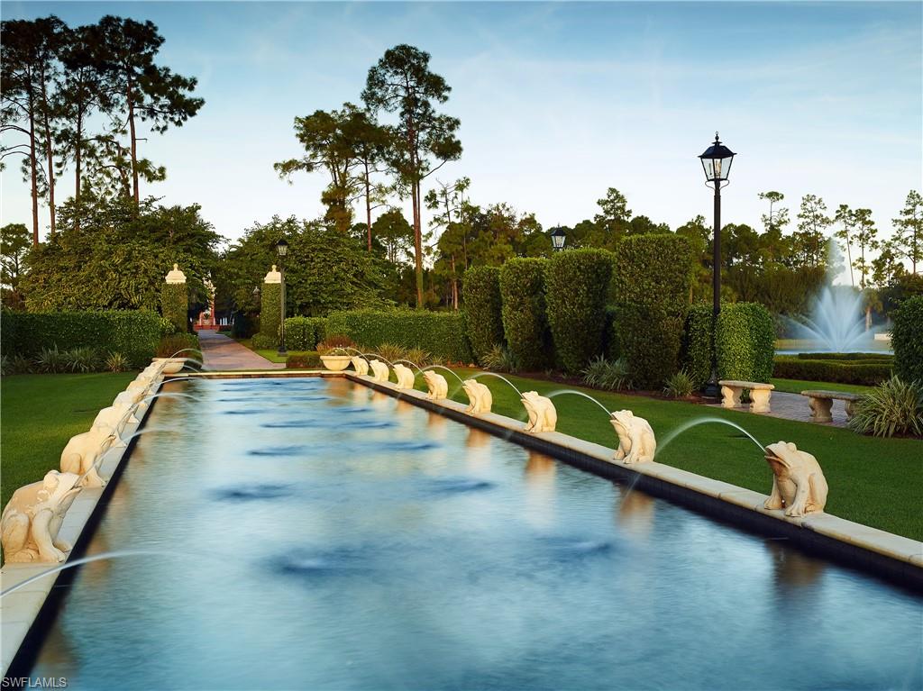 16736 Lucarno Way Naples, FL 34110 - Photo 39 of 49 Community fountain and park features a peaceful setting , benches and walking trails