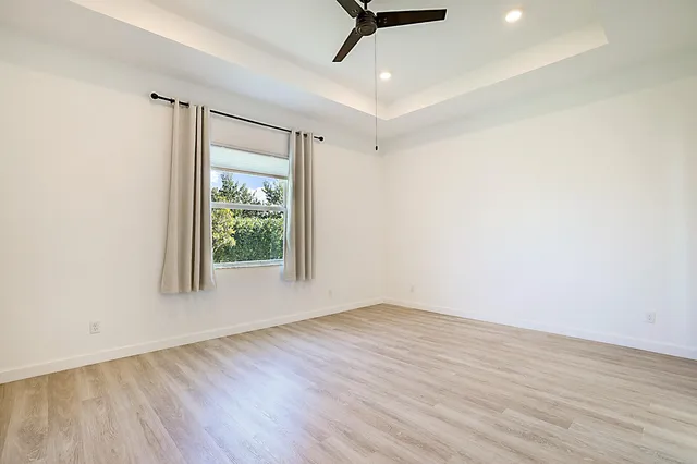a bathroom with a double vanity sink and mirror