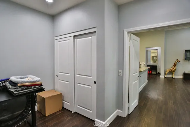 a room with furniture and wooden floor