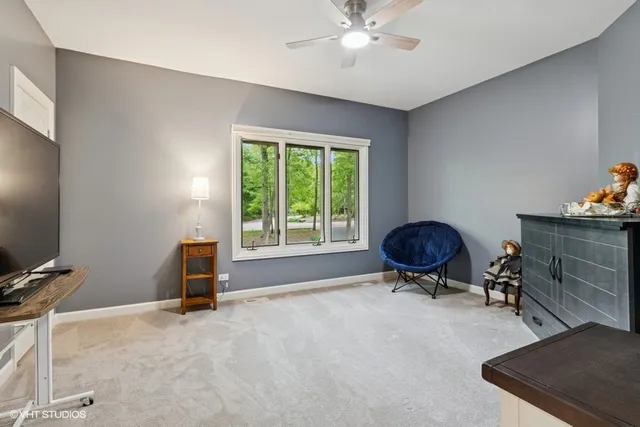 a room with a window and gym equipment