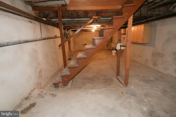 a view of a room with racks on the wall